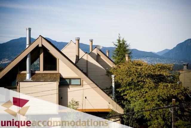 Furnished 3-bedroom duplex with city view and mountain backdrop. - 2555 W 2nd Avenue, Vancouver West Side