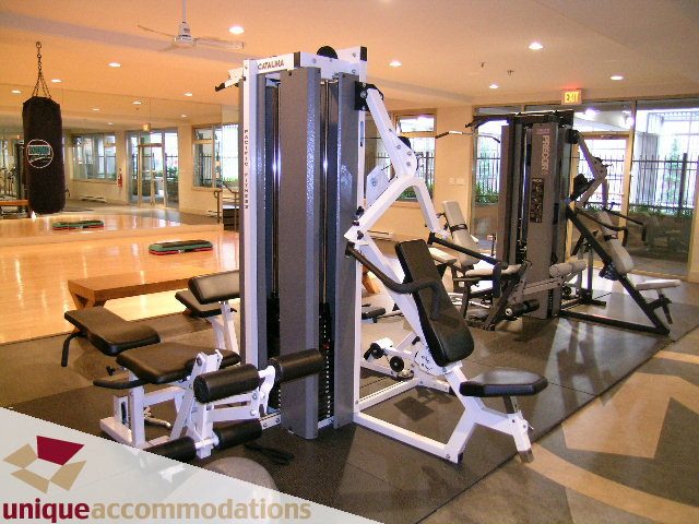 Fitness room with modern equipment and hardwood floors. - PH2 - 969 Richards Street, Vancouver Downtown