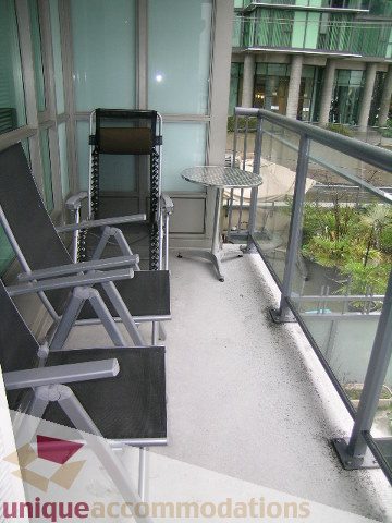 Furnished balcony with outdoor seating and city view. - 603 - 1328 West Pender, Vancouver Downtown