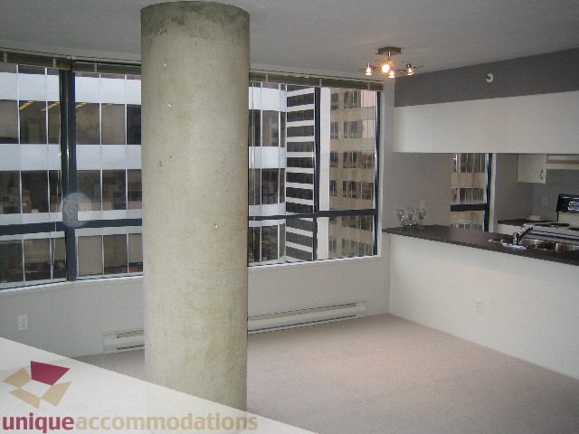 Bright kitchen with modern countertops and city view. - 1906 - 1060 Alberni Street, Vancouver Downtown