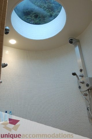 Bright bathroom with a skylight and modern fixtures. - 6290 Collingwood Street, Vancouver West Side