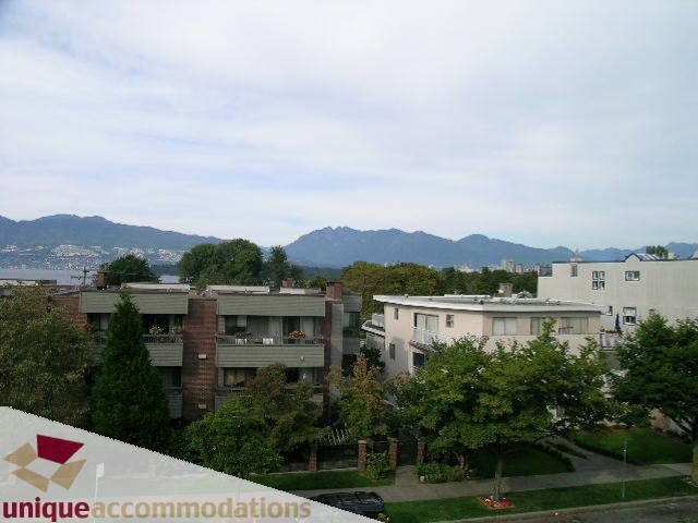 Furnished 2-bedroom townhouse with a stunning city view and lush greenery. - 2234 York Ave, Vancouver West Side