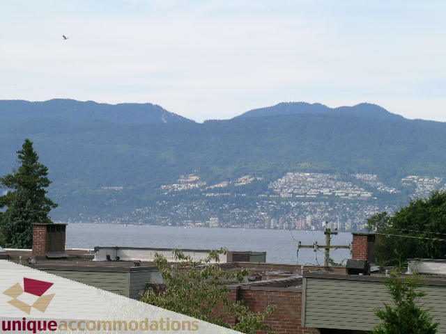 Furnished 2-bedroom townhouse with stunning city view and rooftop access. - 2234 York Ave, Vancouver West Side