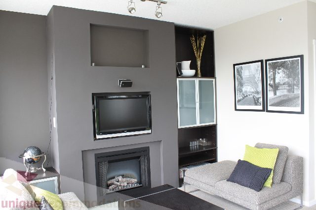 Furnished living room with modern furniture, gray walls, and a large window. - 2103 - 1001 Homer Street, Vancouver Downtown