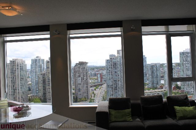 Spacious living room with panoramic city view and modern furnishings. - 2103 - 1001 Homer Street, Vancouver Downtown