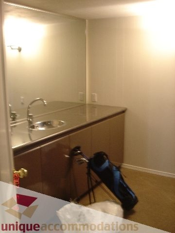 Furnished bathroom with light wood cabinets and modern sink. - 100 Lions Bay Avenue, West Vancouver