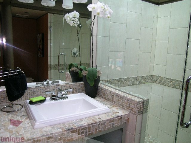 Furnished bathroom with mosaic countertop and modern fixtures. - 455 Keith Road, West Vancouver