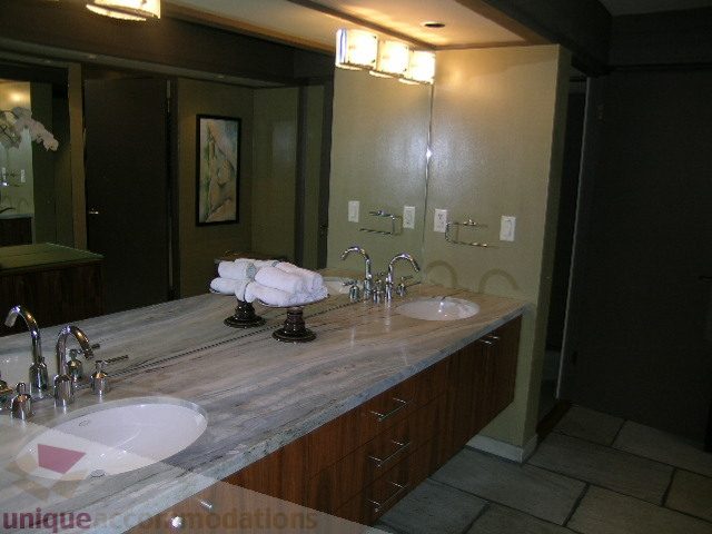Furnished bathroom with granite countertops and modern fixtures. - 455 Keith Road, West Vancouver
