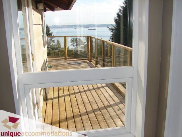 Bright deck with wooden flooring and stunning ocean view. - 3580 Westmount Court, West Vancouver