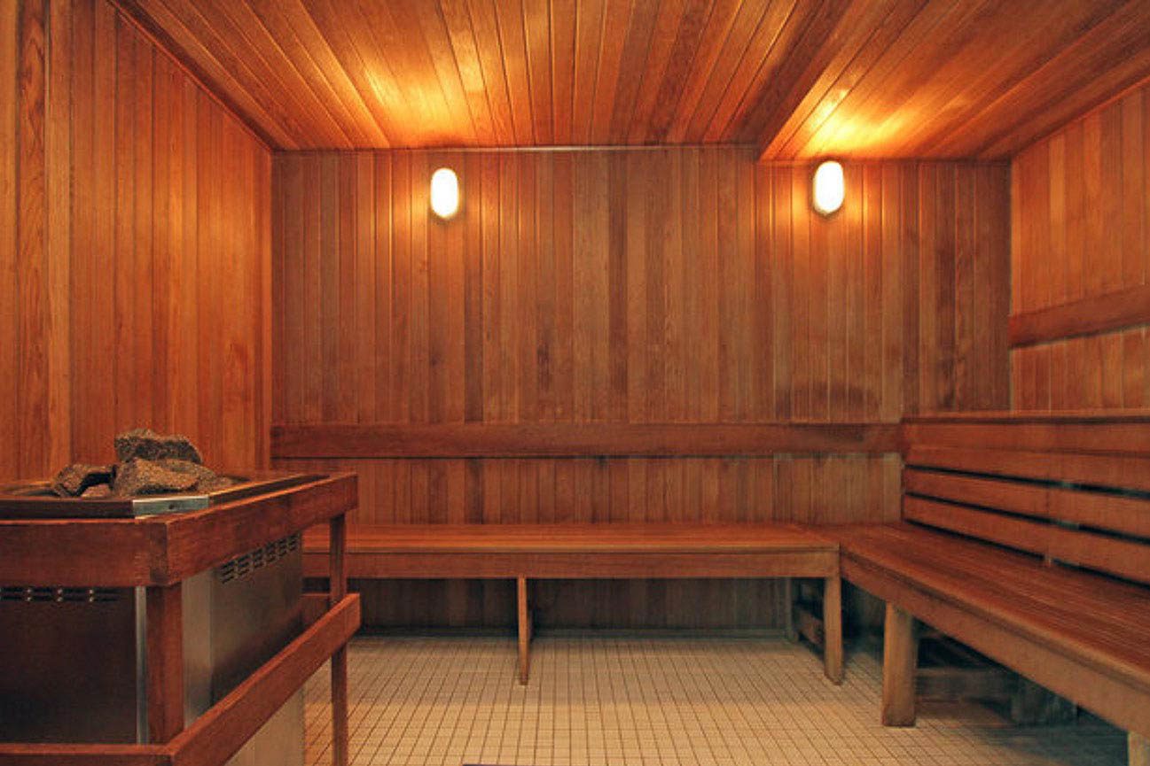 Wooden sauna with warm wood paneling and built-in benches for relaxation. - 3209 - 928 Beatty Street, Vancouver Downtown