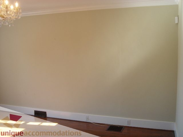 Bright living room with hardwood floors and a chandelier. - 1475 W 33rd Ave, Vancouver West Side