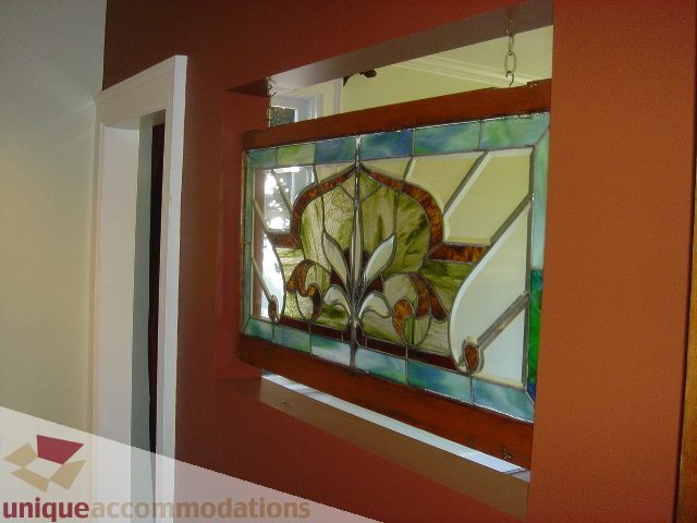 Foyer with stained glass window, warm wood trim. - 1475 W 33rd Ave, Vancouver West Side