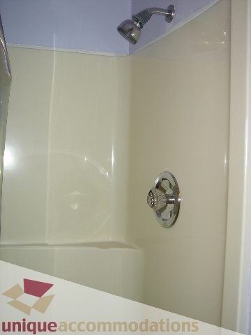 Bathroom with shower and bathtub, clean and modern. - 1475 W 33rd Ave, Vancouver West Side