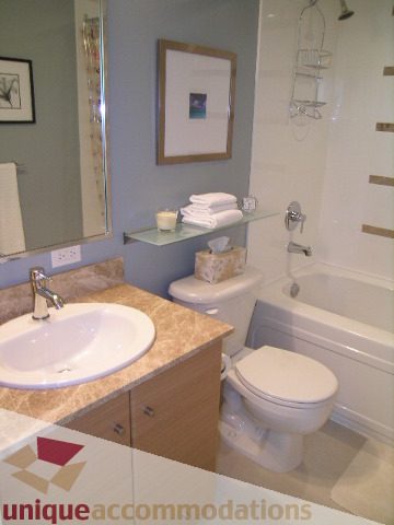 Bright bathroom with granite countertops and a modern sink. - 2707 - 928 Homer Street, Vancouver Downtown