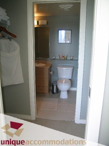 Furnished bathroom with countertop and mirror. - 1110 - 977 Mainland Street, Vancouver Downtown