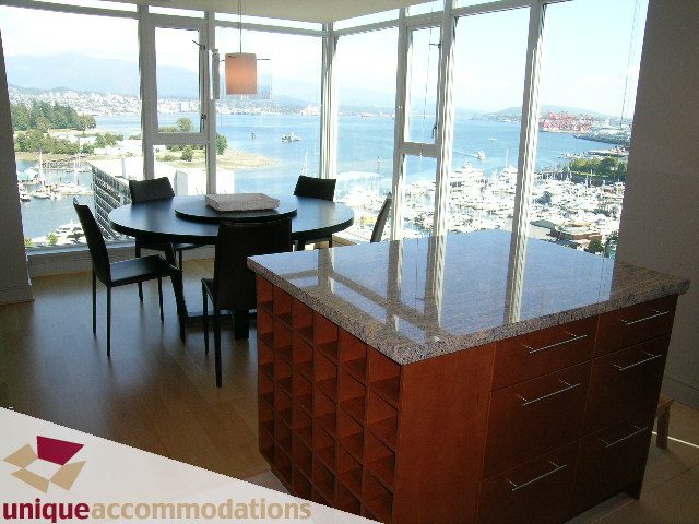 Furnished kitchen with granite countertops and city view. - 1603-1650 Bayshore Drive, Vancouver Downtown