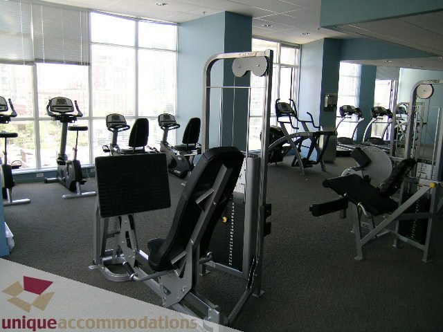 Furnished gym with cardio equipment and large windows. - 1207 - 1155 Seymour Street, Vancouver Downtown