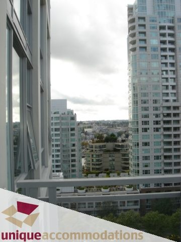 Spacious 2-bedroom condo with stunning city view and modern furnishings. - 1101 -1455 Howe Street, Vancouver Downtown