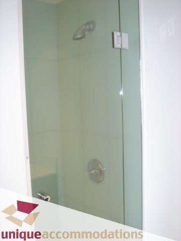 Spacious bathroom with modern glass shower and sleek fixtures. - 1101 -1455 Howe Street, Vancouver Downtown