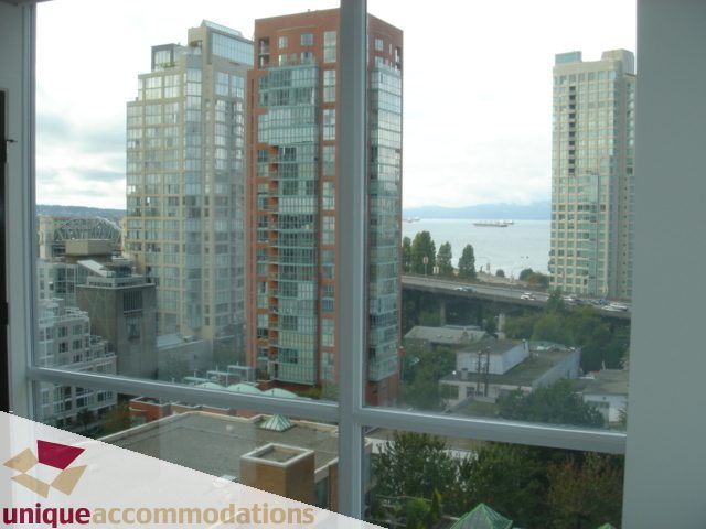 Spacious 2-bedroom condo with stunning city view and modern furnishings. - 1101 -1455 Howe Street, Vancouver Downtown