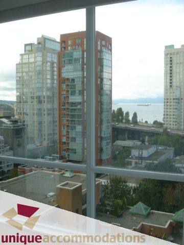Spacious 2-bedroom condo with stunning city view and modern furnishings. - 1101 -1455 Howe Street, Vancouver Downtown