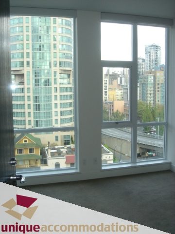 Spacious 2-bedroom condo with a stunning city view from the large windows. - 1101 -1455 Howe Street, Vancouver Downtown