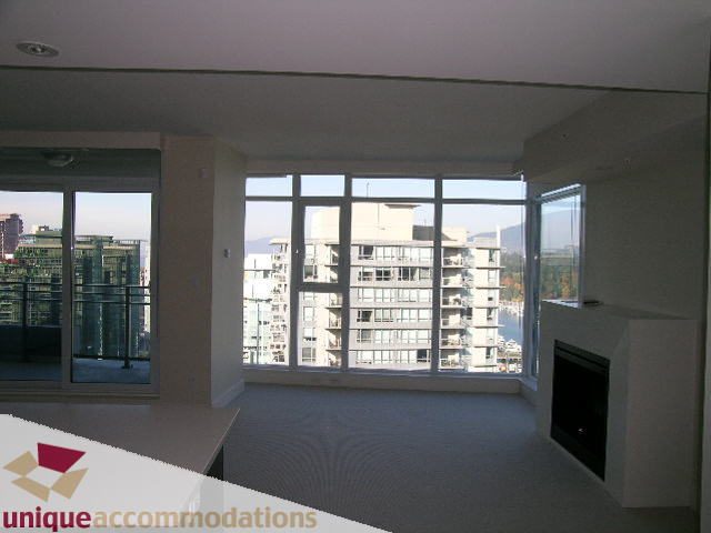 Spacious living room with large windows, city view, and modern furnishings. - 2801 - 1205 W. Hastings Street, Vancouver Downtown