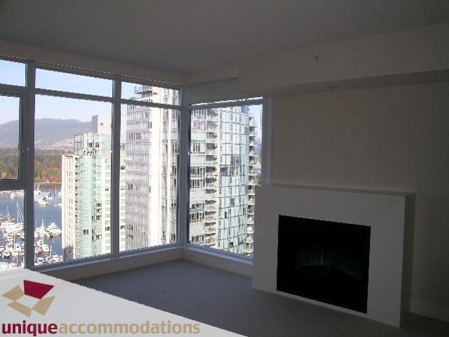 Bright living room with city view and modern fireplace. - 2801 - 1205 W. Hastings Street, Vancouver Downtown