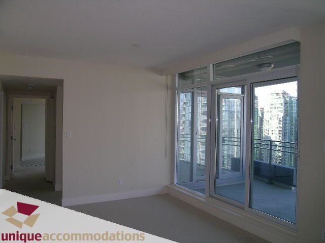 Spacious living room with large windows offering a city view. - 2801 - 1205 W. Hastings Street, Vancouver Downtown