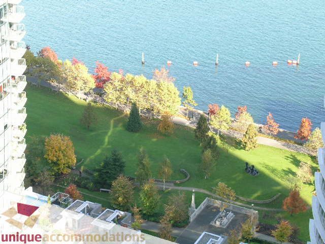 Furnished living room with city view and waterfront access. - 2801 - 1205 W. Hastings Street, Vancouver Downtown