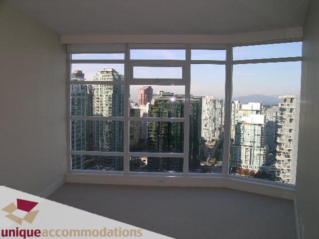 Bright living room with large windows offering a stunning city view. - 2801 - 1205 W. Hastings Street, Vancouver Downtown