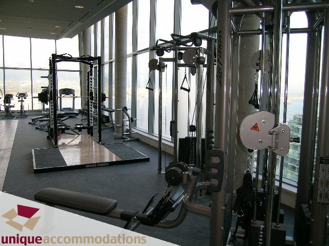 Bright gym with city view and modern equipment. - 705 - 1205 W Hastings, Vancouver Downtown