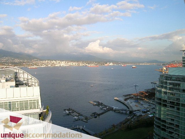 Furnished 1-bedroom condo with stunning city view and waterfront access. - 705 - 1205 W Hastings, Vancouver Downtown