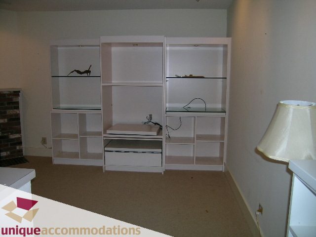 Bright living room with white shelving and countertop, ready for furnishings. - 782 W 22nd Ave, Vancouver West Side