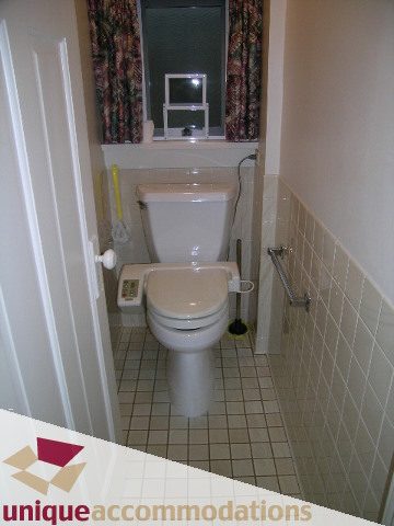 Bathroom with white fixtures and tiled floor. - 782 W 22nd Ave, Vancouver West Side