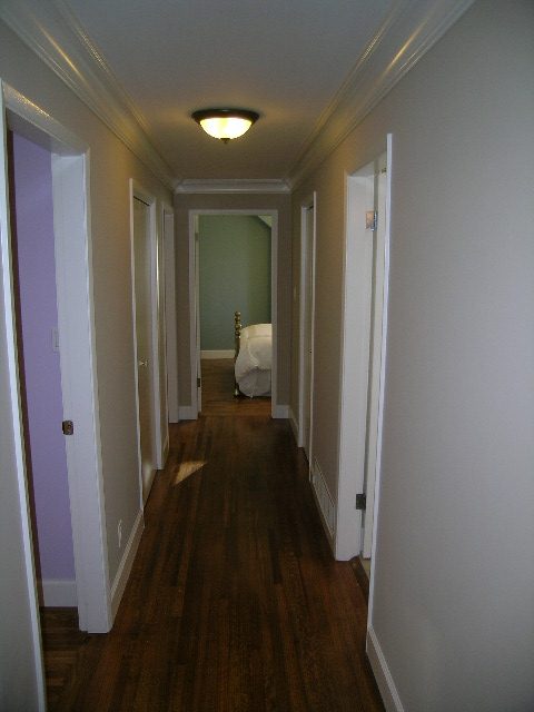 Spacious hallway with hardwood floors and a cozy corner nook. - 3554 St. Andrews Avenue, North Vancouver