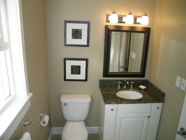 Bathroom with granite countertops and modern lighting fixtures. - 3554 St. Andrews Avenue, North Vancouver