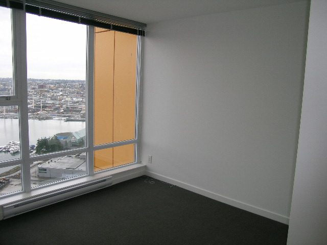 Spacious den with floor-to-ceiling windows offering a stunning city view. - 3309-111 W Georgia, Vancouver Downtown