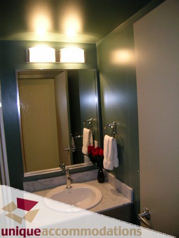 Furnished bathroom with marble countertop and modern sink. - 2314 - 938 Smithe Street, Vancouver Downtown