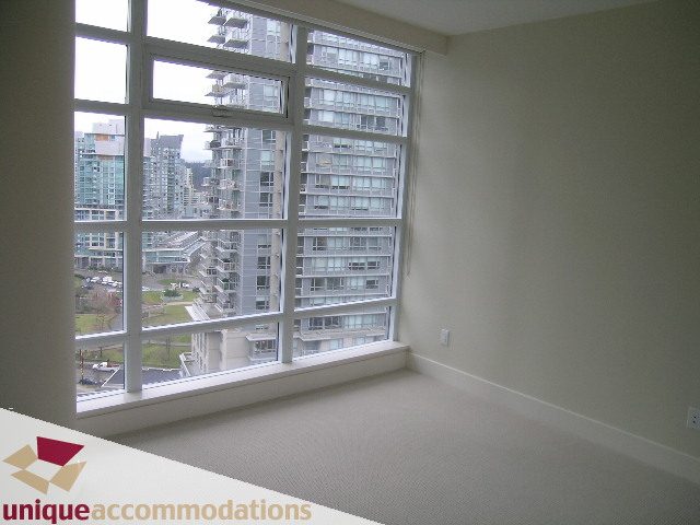 Bright living room with city view and large windows. - 1805 -1205 W Hastings, Vancouver Downtown