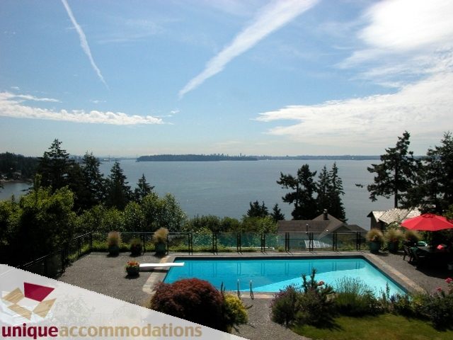 Spacious living room with a stunning city view and a large, inviting pool. - 3586 Creery Ave, West Vancouver