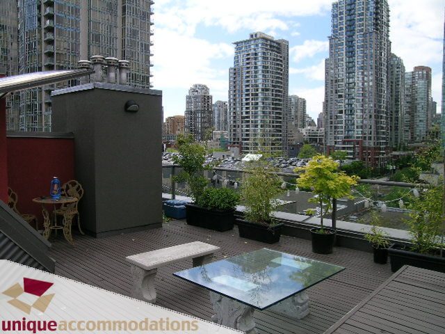 Furnished penthouse with city view and outdoor seating area. - PH2 - 869 Beatty Street, Vancouver Downtown
