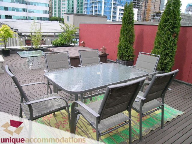 Furnished patio with outdoor seating and city views. - PH2 - 869 Beatty Street, Vancouver Downtown