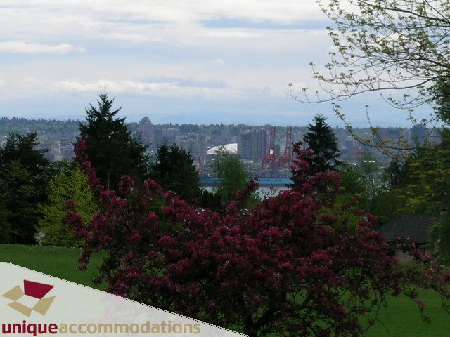 Furnished 5-bedroom suite with stunning city view and blooming trees. - 1505 Grand Blvd., North Vancouver