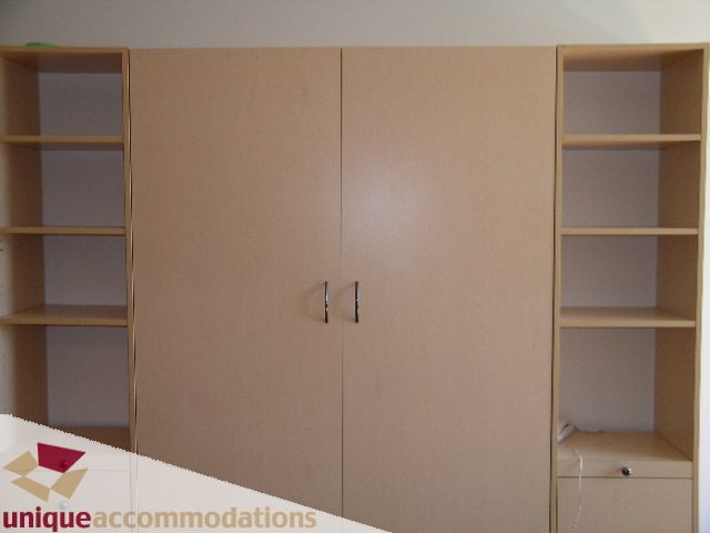 Furnished loft with large closet and shelving unit. - 512-1216 Homer Street, Vancouver Downtown