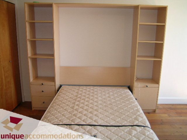 Furnished loft with built-in shelving and hardwood floors. - 512-1216 Homer Street, Vancouver Downtown