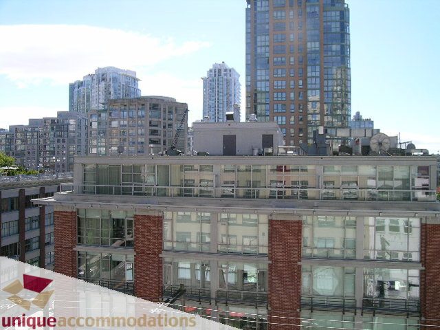 Furnished loft with city view and modern architecture. - 512-1216 Homer Street, Vancouver Downtown