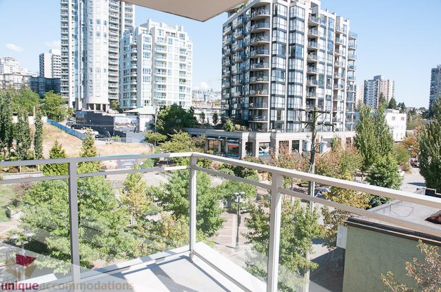 Furnished 2-bedroom condo with city view and modern balcony. - 508-155 West 1st Street, North Vancouver