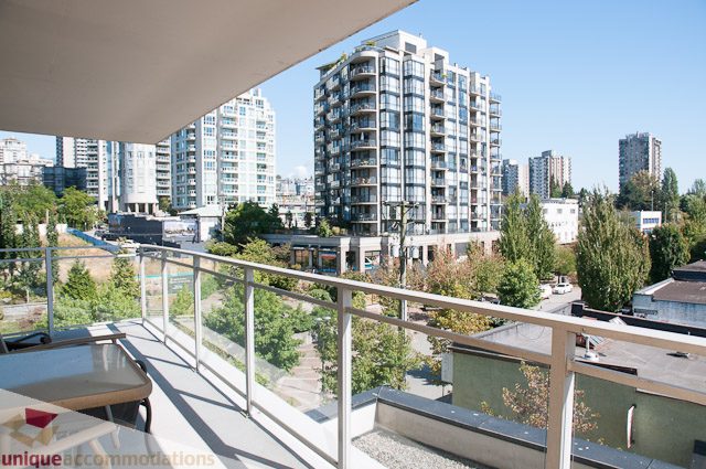 Bright balcony with city view and modern furnishings. - 508-155 West 1st Street, North Vancouver