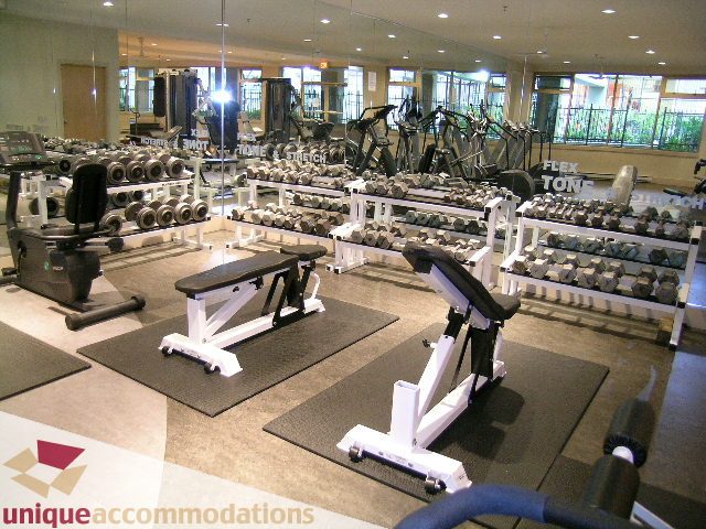 Fitness center with dumbbells and exercise equipment. - 2001-1199 Seymour Street, Vancouver Downtown